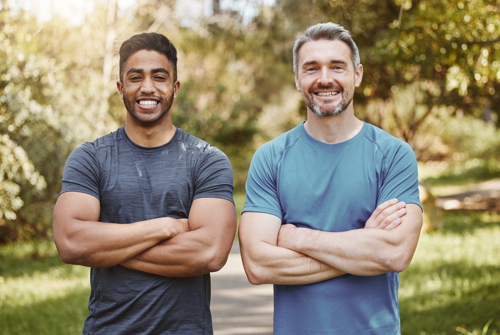 Men, arms crossed and together in portrait, fitness and health and ready for workout, training or s